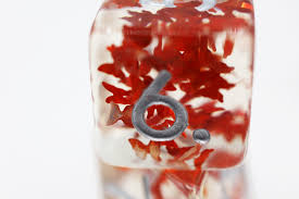 Butterfly kiss - orange RPG Dice Set by Foam Brain Games